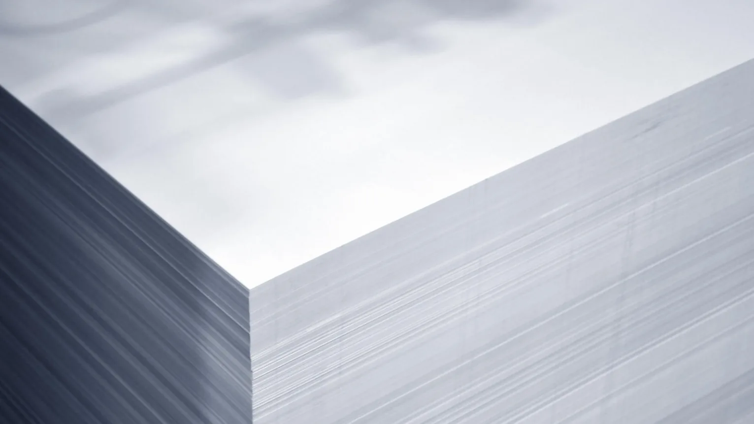 A crisp stack of freshly printed paper